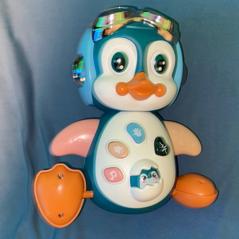 Interactive Penguin Toy with Lights and Sounds